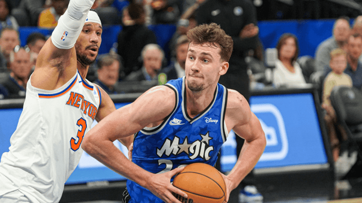 Orlando Magic forward Franz Wagner runs towards the basket as Josh Hart #3 adds pressure at the Kia Center.